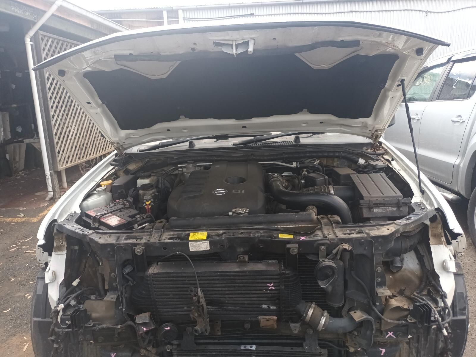 The Hood of a Car is Open and the Engine is Visible — South West 4WD Wreckers In Brisbane, QLD 