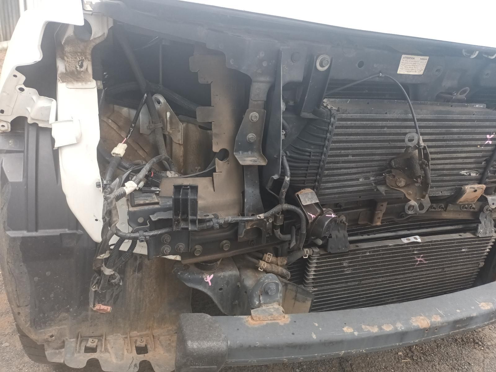 The Front of a White Car with the Radiator Removed — South West 4WD Wreckers In Brisbane, QLD