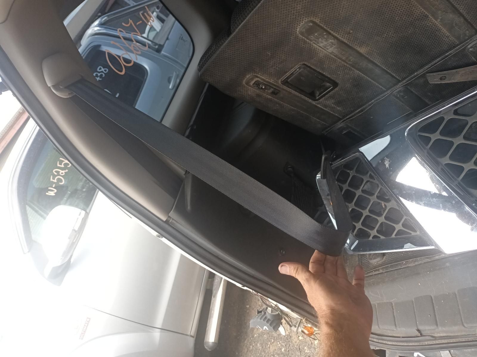 A Person is Putting a Seat Belt on a Car — South West 4WD Wreckers In Brisbane, QLD