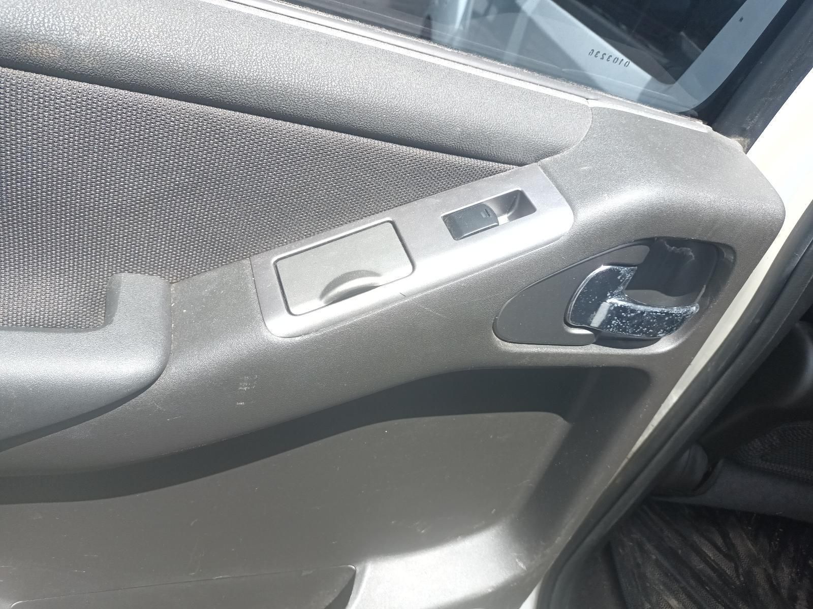 A Close Up of a Car Door with a Window Switch — South West 4WD Wreckers In Brisbane, QLD