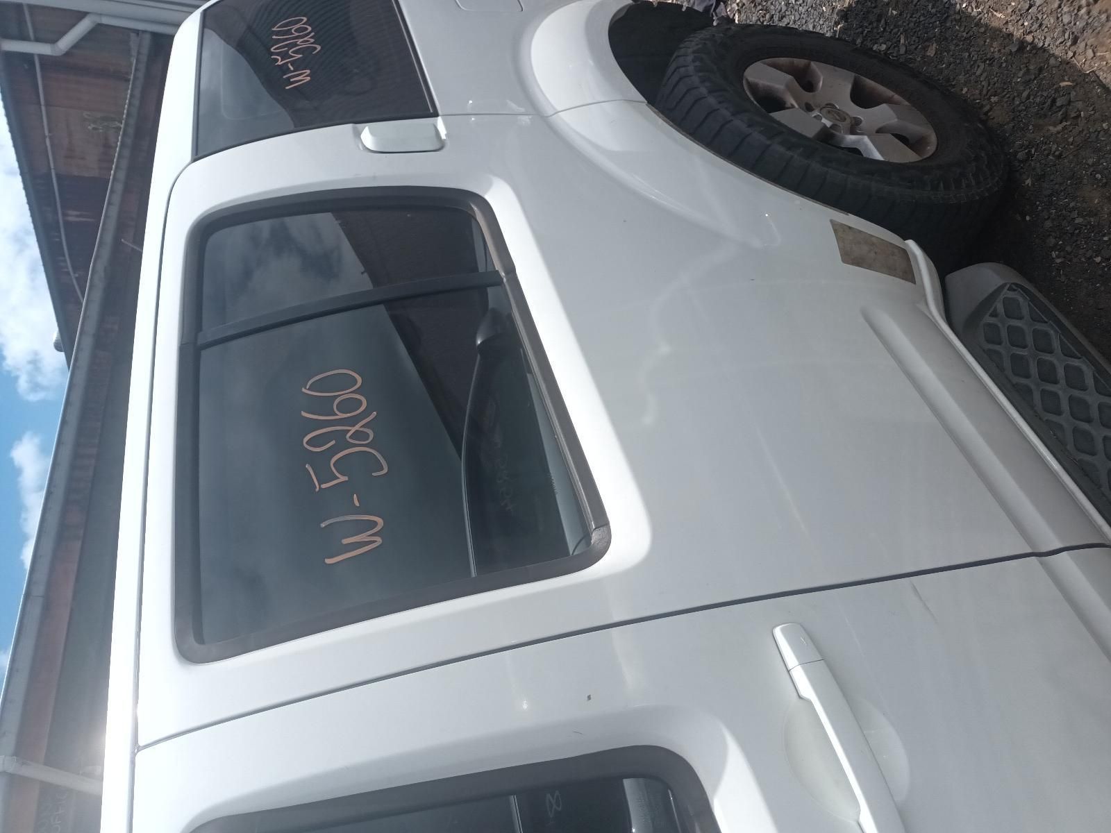 A White Truck with Numbers Written on the Side — South West 4WD Wreckers In Brisbane, QLD