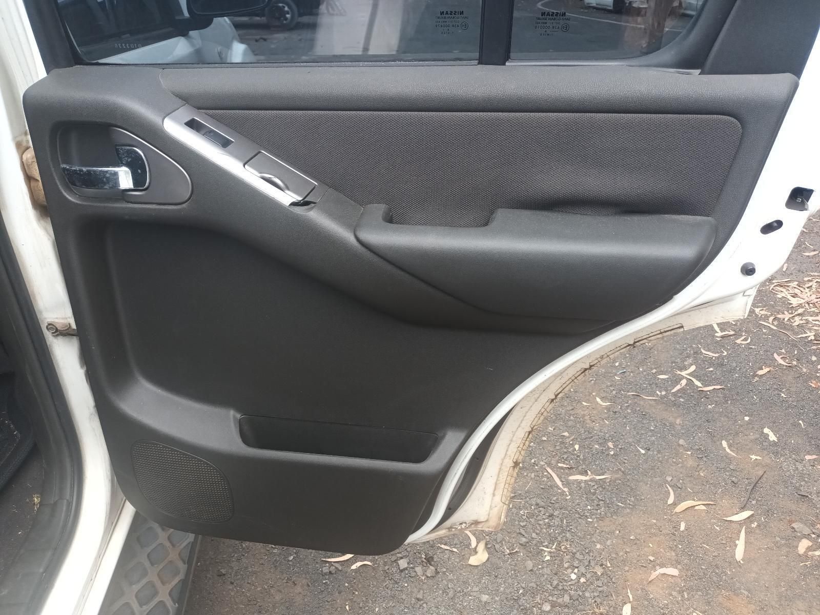 The Back Door of a White Car with the Door Open — South West 4WD Wreckers In Brisbane, QLD