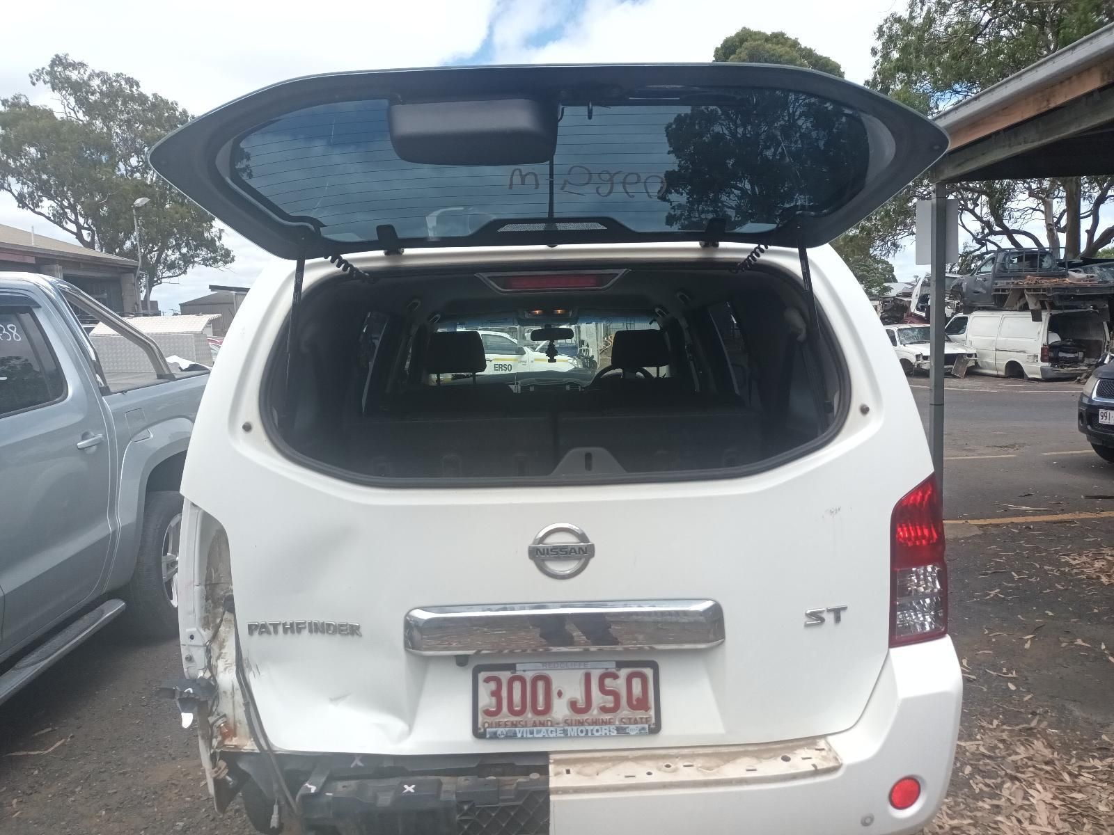 A White Nissan Pathfinder with the Trunk Open — South West 4WD Wreckers In Brisbane, QLD