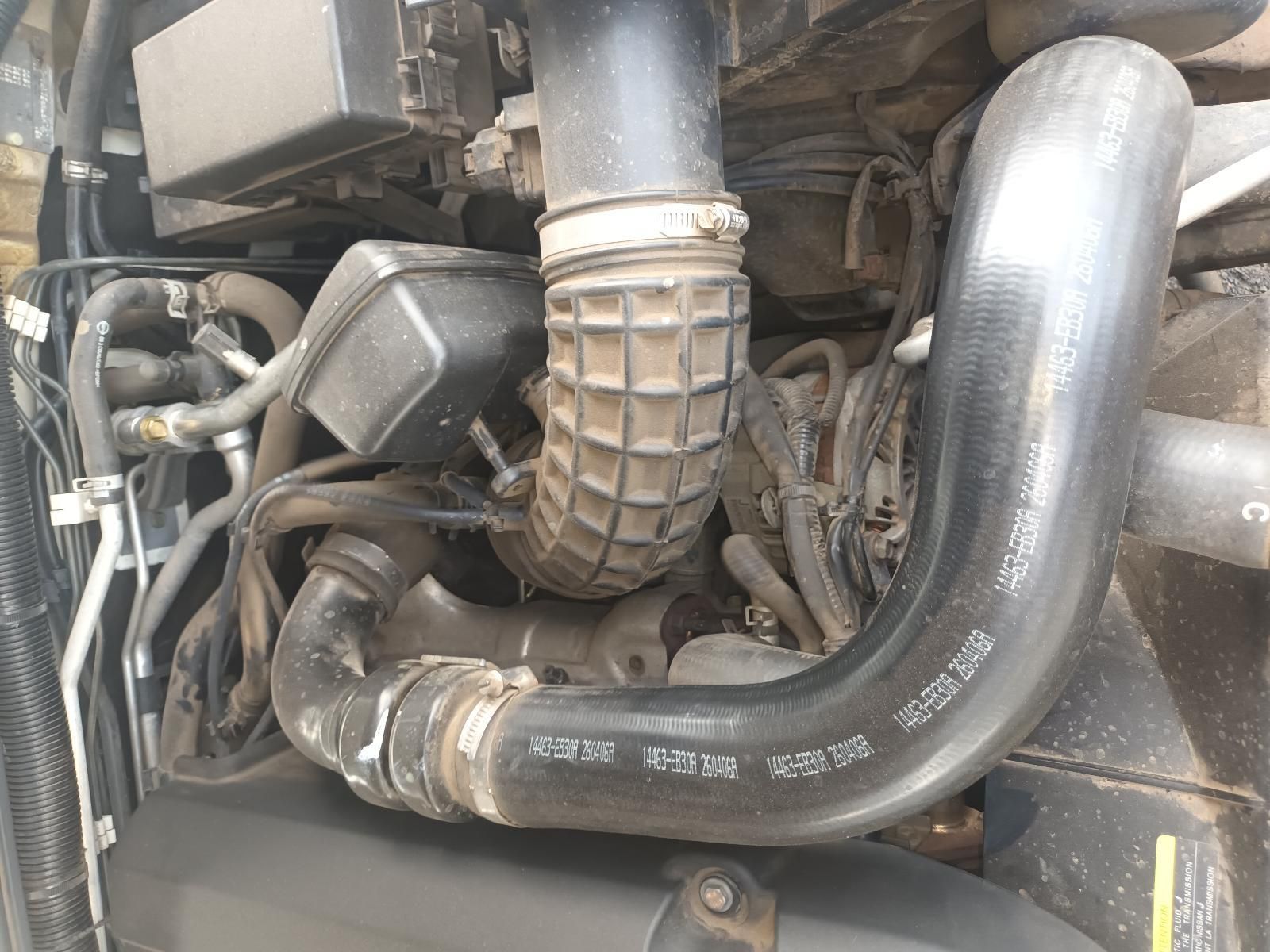 A Close Up of a Car Engine with a Hose Attached to It — South West 4WD Wreckers In Brisbane, QLD