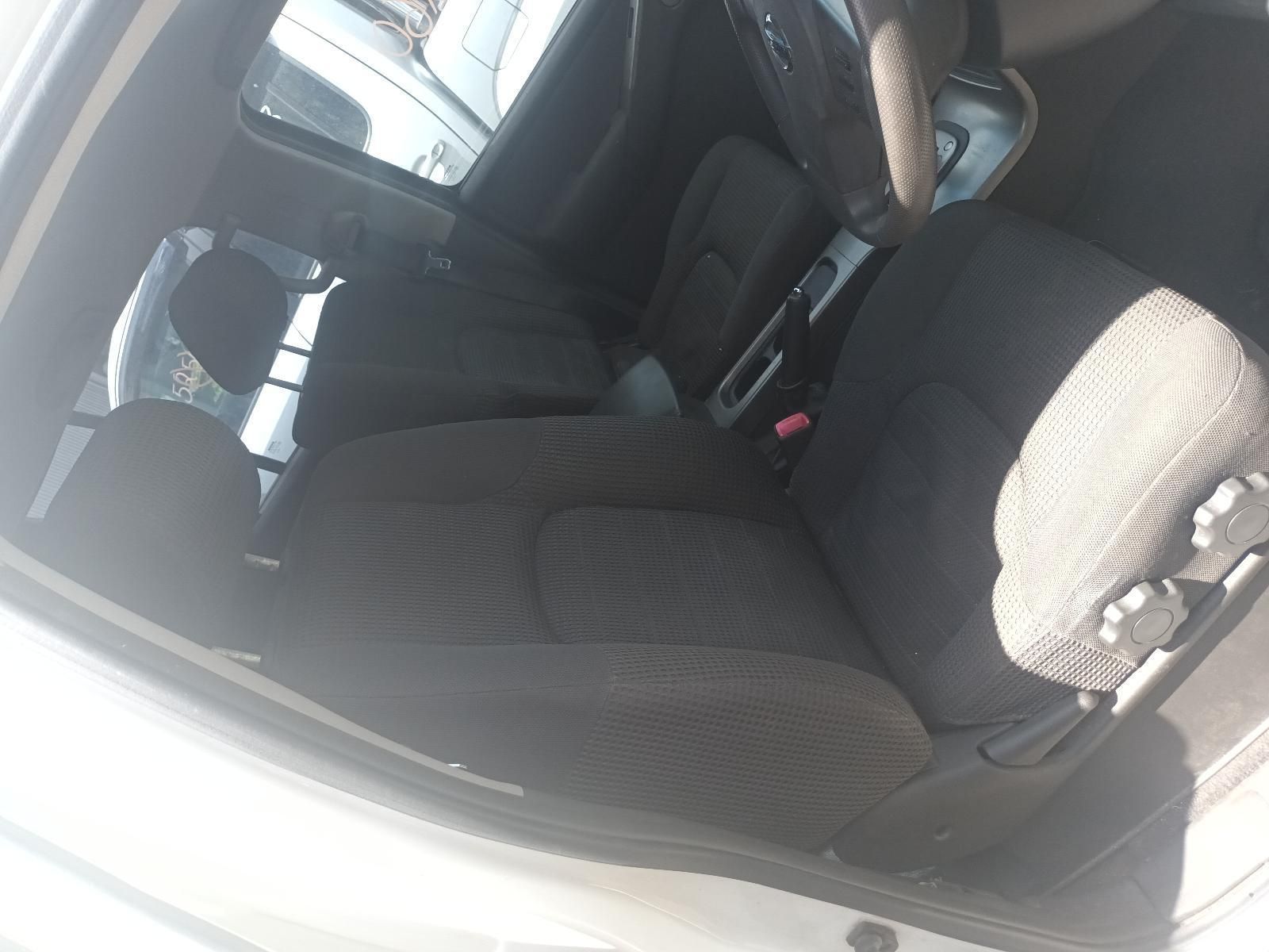 The Inside of a White Car with Black Seats — South West 4WD Wreckers In Brisbane, QLD