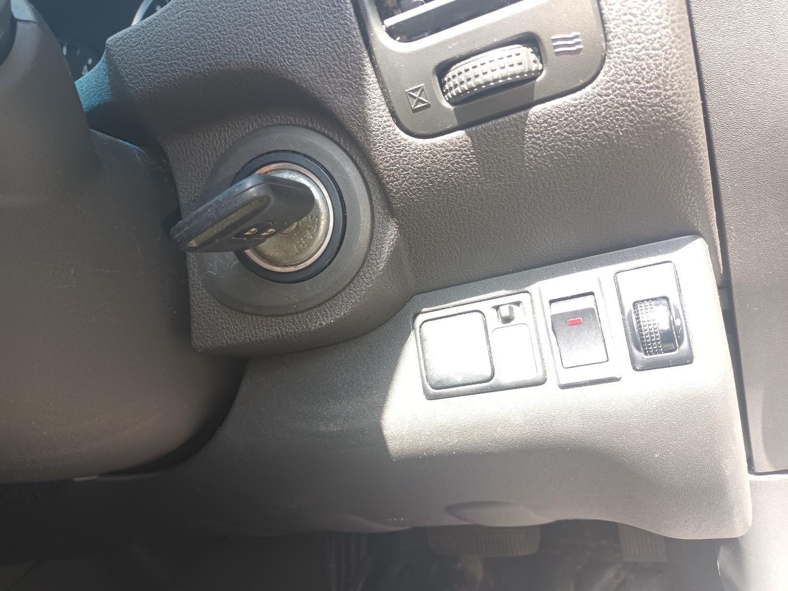 A Close Up of a Car Dashboard with a Key in the Ignition — South West 4WD Wreckers In Brisbane, QLD