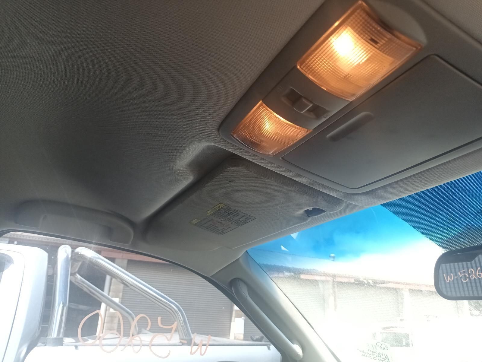 The Ceiling of a Car Has a Light on It — South West 4WD Wreckers In Brisbane, QLD