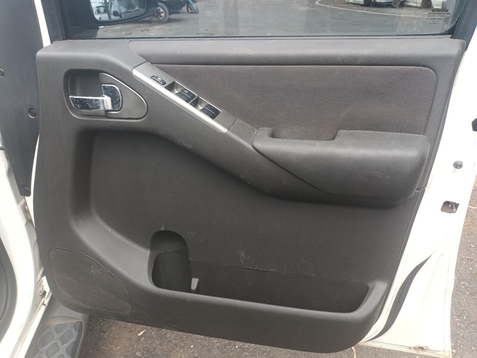 The Door of a White Car is Open and Empty — South West 4WD Wreckers In Brisbane, QLD