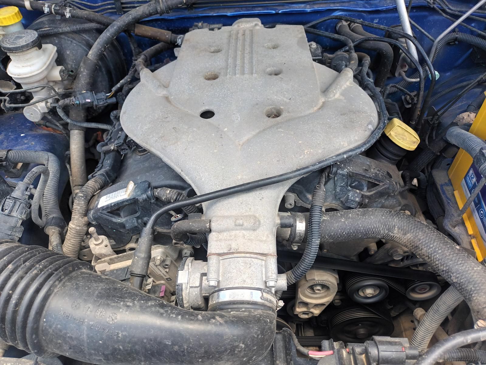 A Close Up of the Engine of a Blue Car — South West 4WD Wreckers In Brisbane, QLD