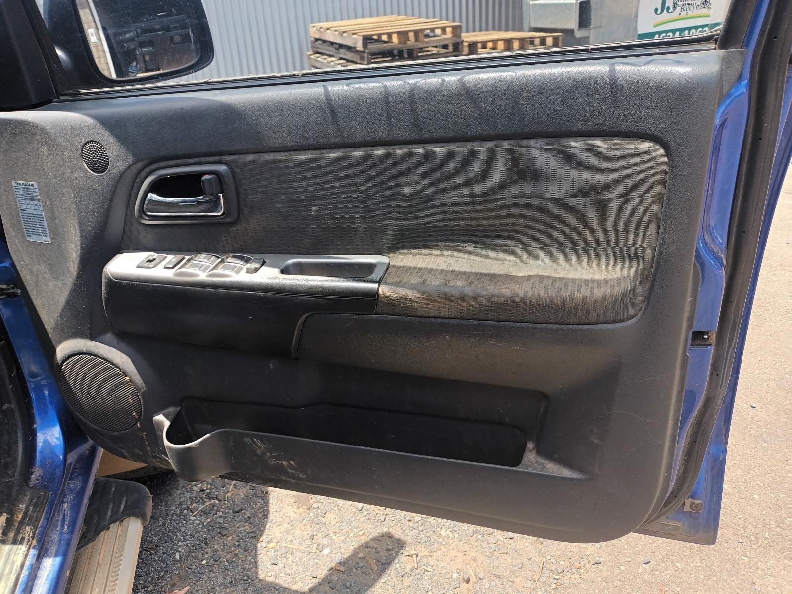 The Door of a Blue Car is Dirty and Needs to Be Cleaned — South West 4WD Wreckers In Brisbane, QLD