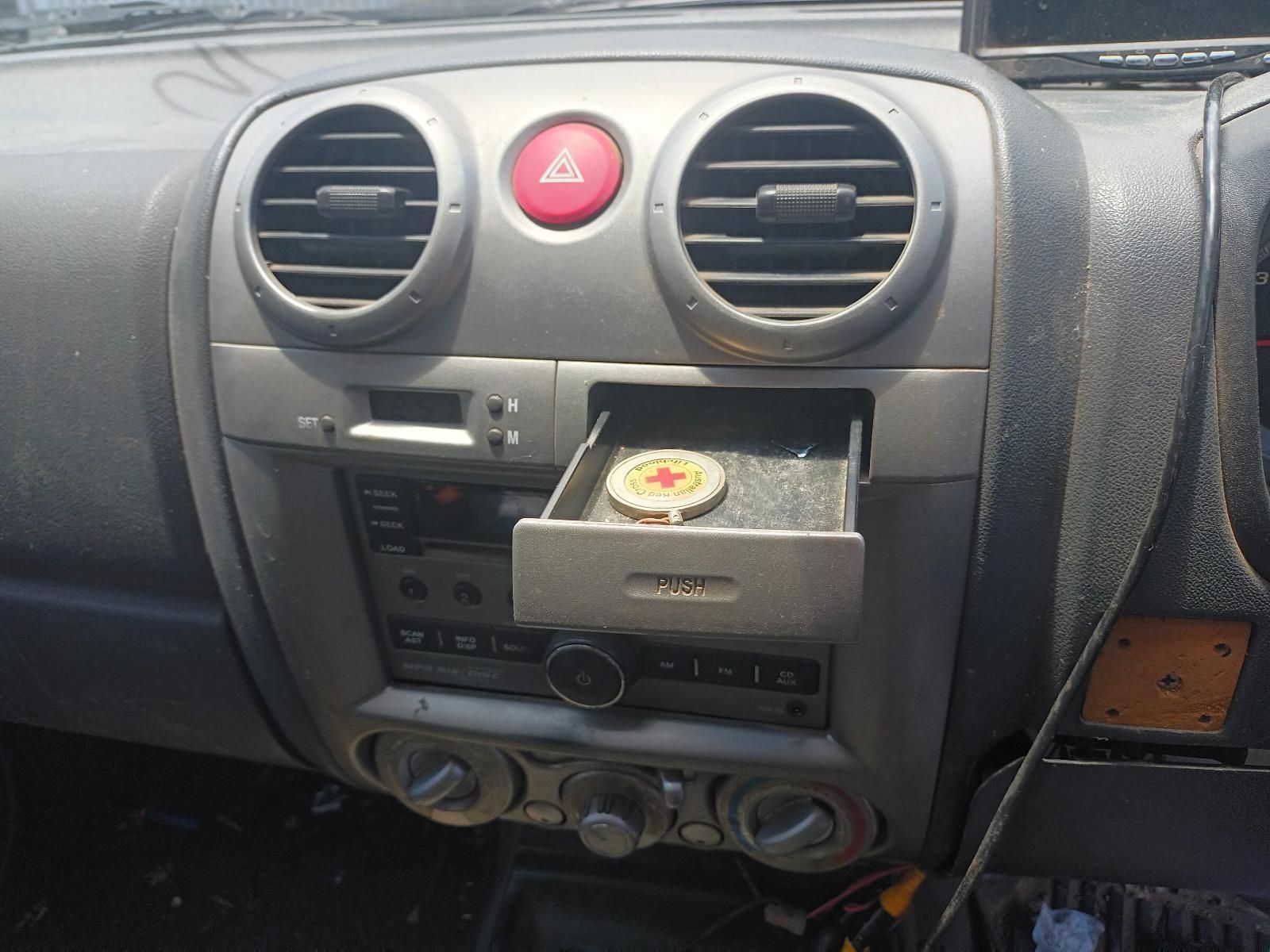The Dashboard of a Car with a Red Warning Light — South West 4WD Wreckers In Brisbane, QLD