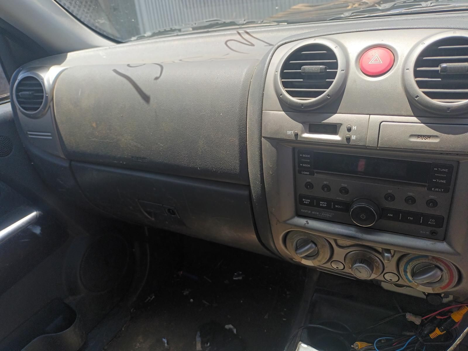 The Dashboard of a Car Has a Red Emergency Button on It — South West 4WD Wreckers In Brisbane, QLD