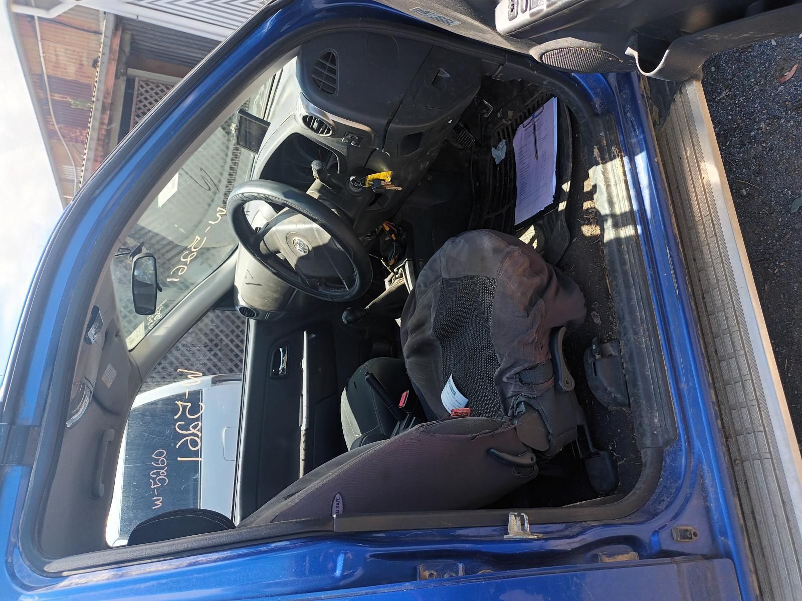 The Inside of a Blue Car with the Door Open — South West 4WD Wreckers In Brisbane, QLD