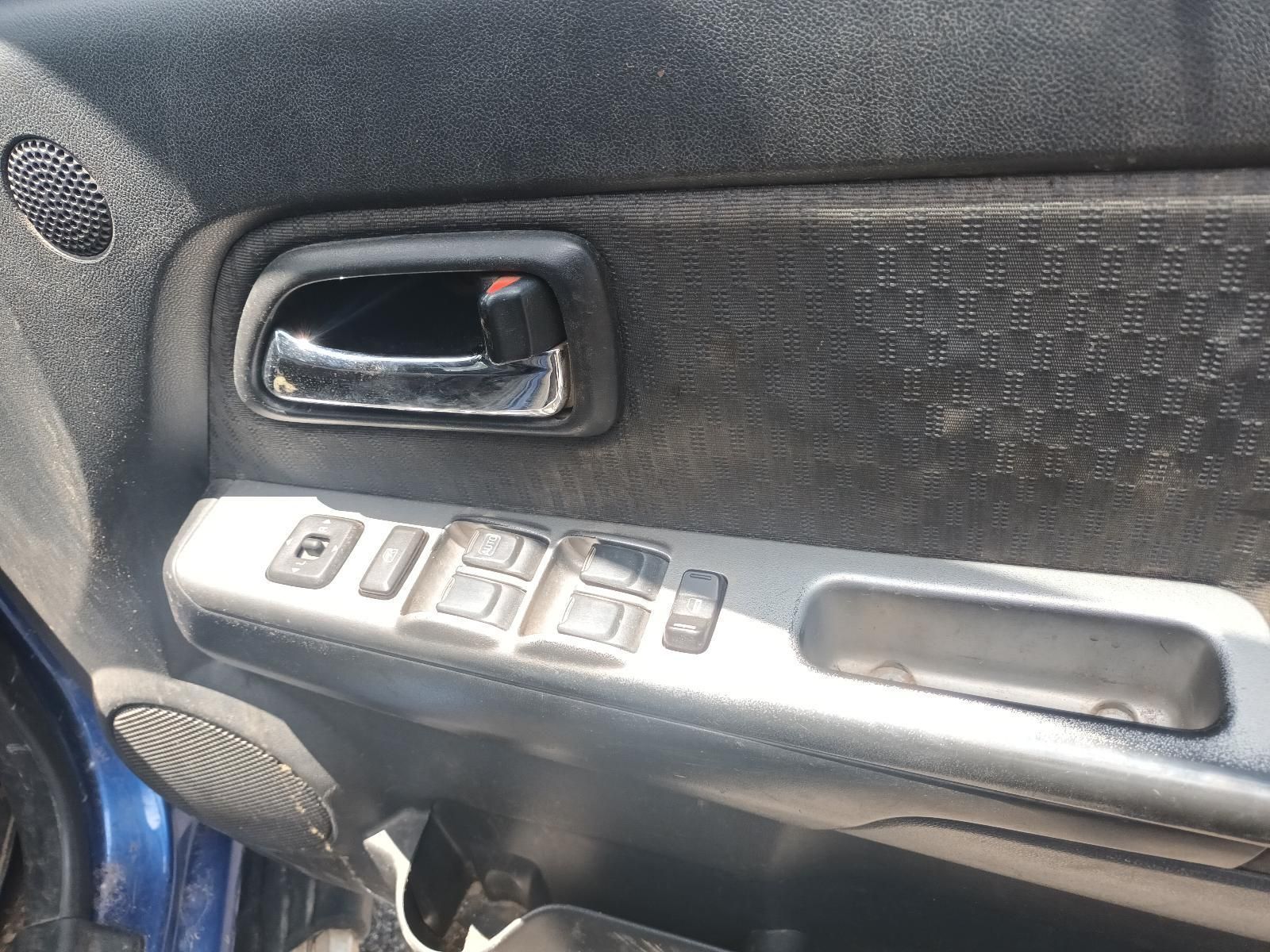 A Close Up of a Car Door Handle on a Blue Car — South West 4WD Wreckers In Brisbane, QLD