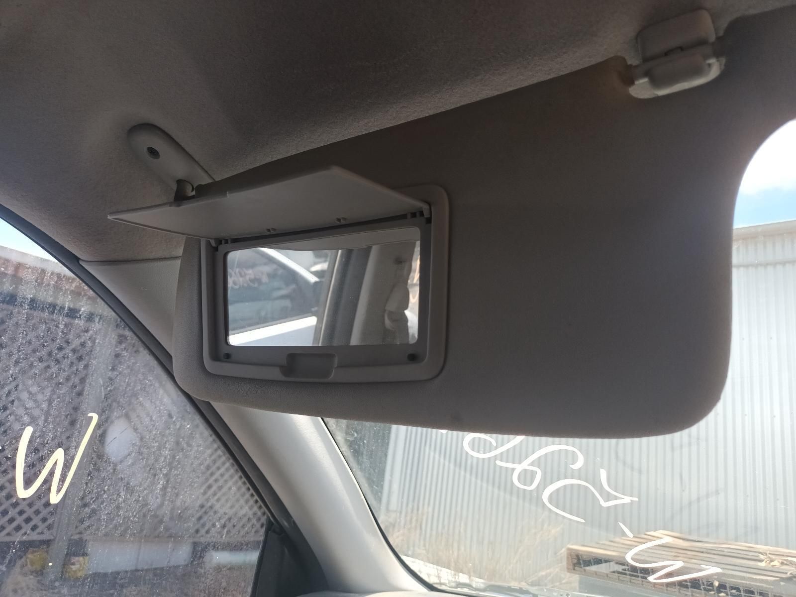 A Car Sun Visor with a Mirror Attached to It — South West 4WD Wreckers In Brisbane, QLD