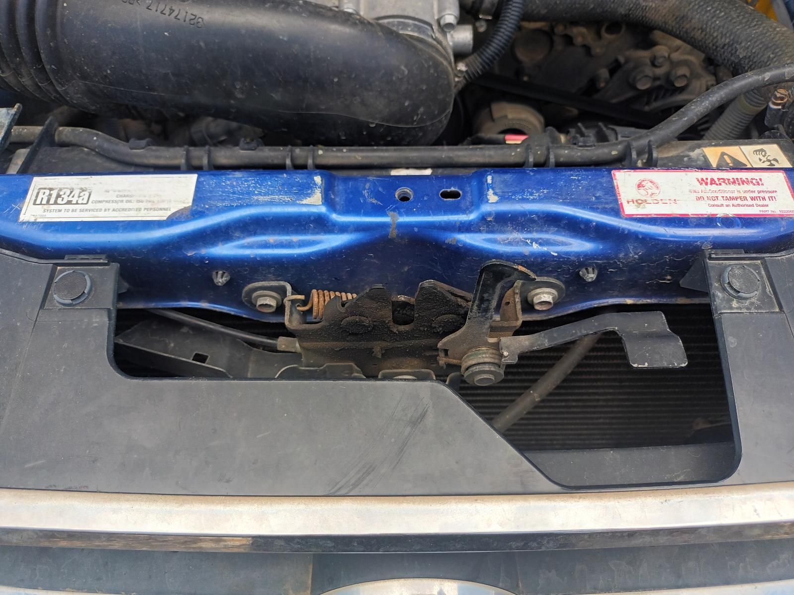 A Close Up of the Underside of a Blue Car's Radiator Grille — South West 4WD Wreckers In Brisbane, QLD