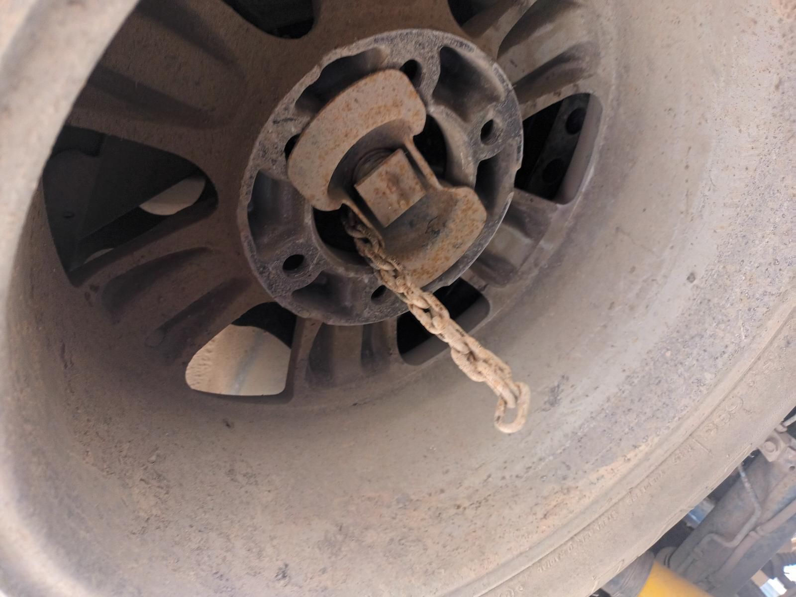 A Close Up of a Tire with a Rope Coming Out of It — South West 4WD Wreckers In Brisbane, QLD