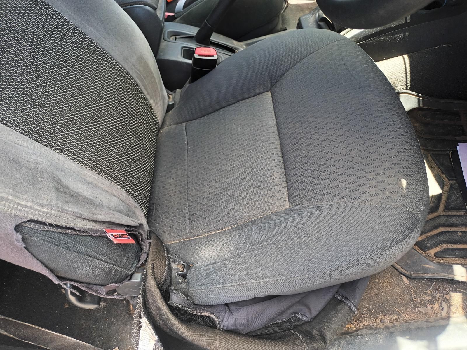 A Car Seat with a Broken Arm Rest is Sitting in a Car — South West 4WD Wreckers In Brisbane, QLD