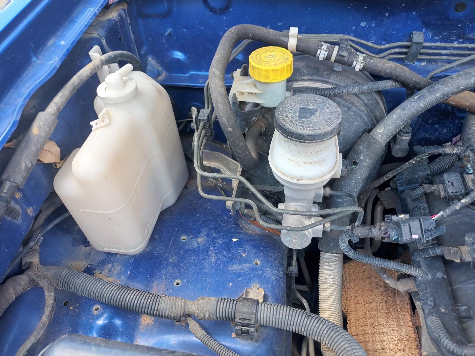 A Close Up of the Engine of a Blue Car — South West 4WD Wreckers In Brisbane, QLD