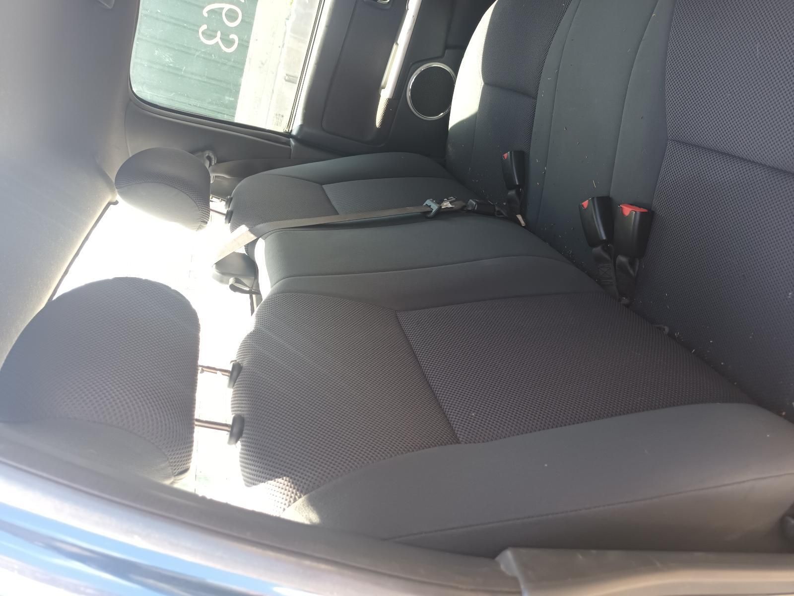 The Back Seat of a Car Has a Seat Belt on It — South West 4WD Wreckers in Harristown, QLD