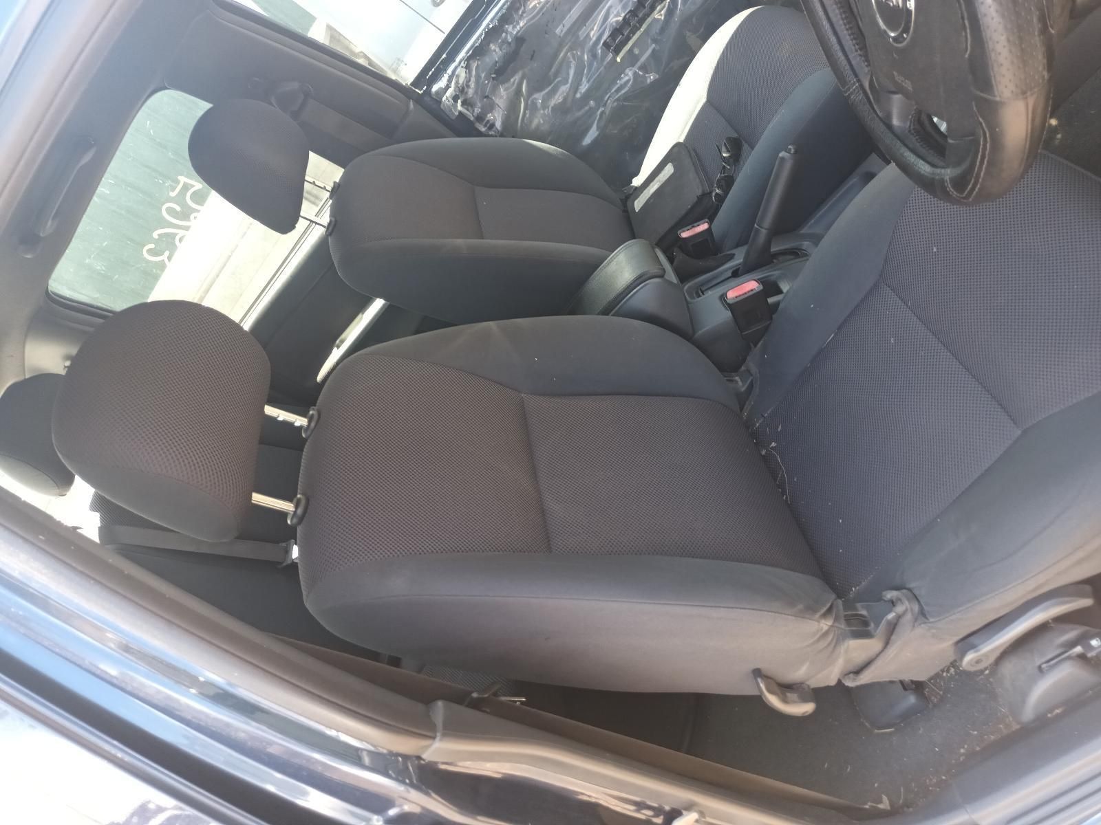 The Inside of a Car with a Steering Wheel and Seats — South West 4WD Wreckers in Harristown, QLD