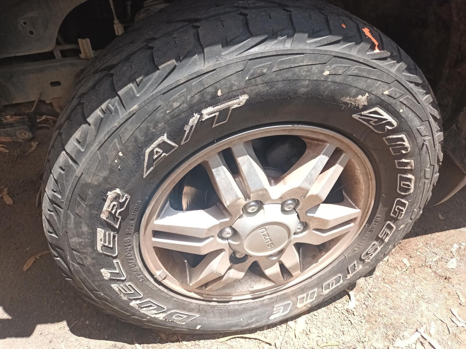 A Close Up of a Tire That Says Terrain on It — South West 4WD Wreckers in Harristown, QLD