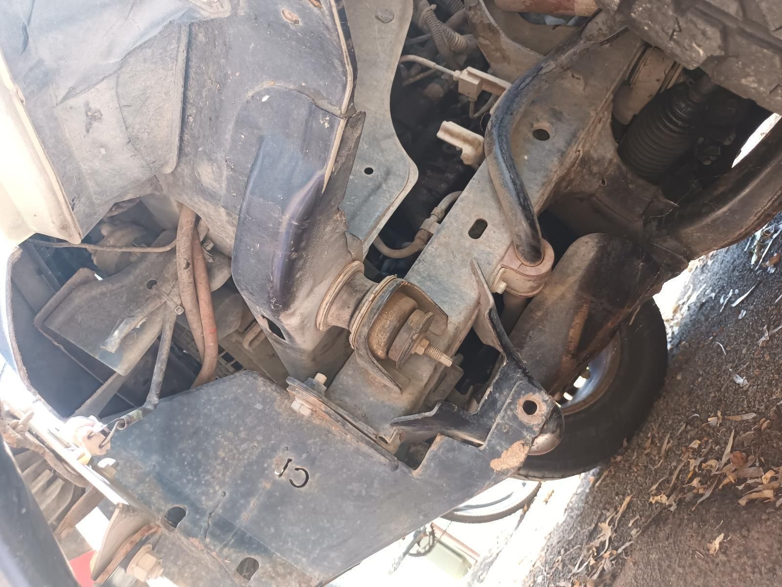 A Close Up of the Underside of a Car with a Broken Fender — South West 4WD Wreckers in Harristown, QLD