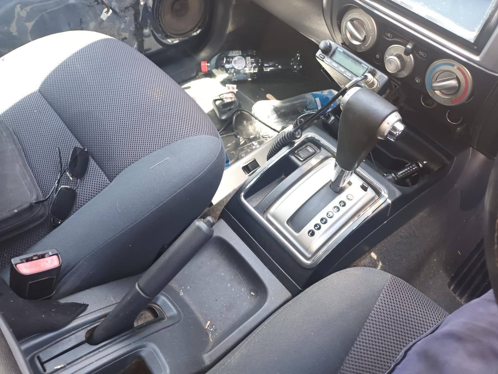 A Person is Sitting in the Driver's Seat of a Car — South West 4WD Wreckers in Harristown, QLD