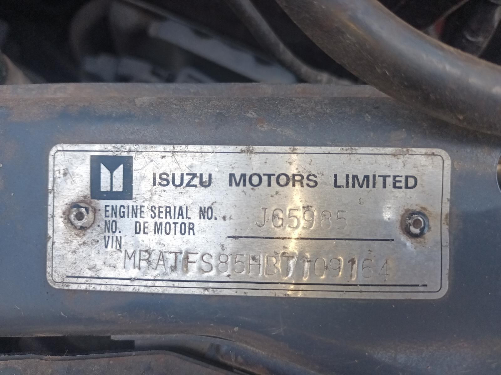 A Close Up of an Isuzu Motors Limited Engine Serial Number — South West 4WD Wreckers in Harristown, QLD
