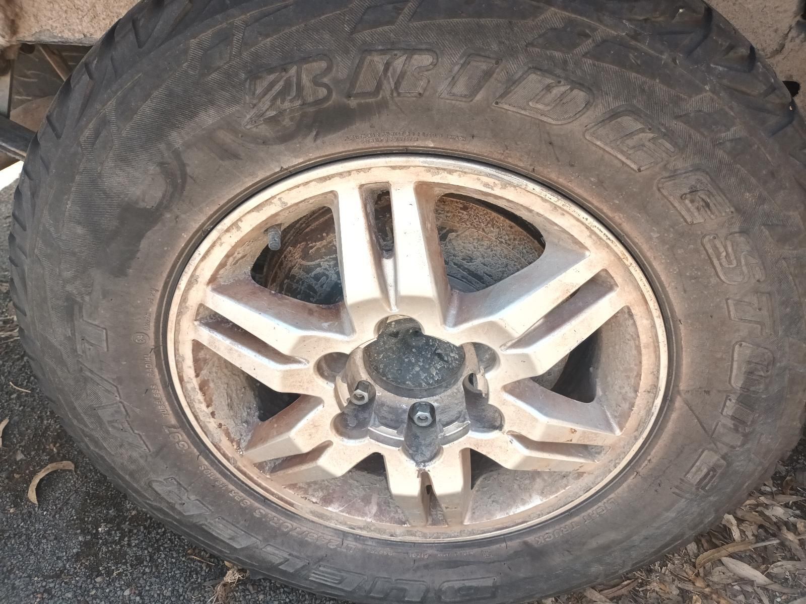 A Close Up of a Dirty Tire on a Car — South West 4WD Wreckers in Harristown, QLD