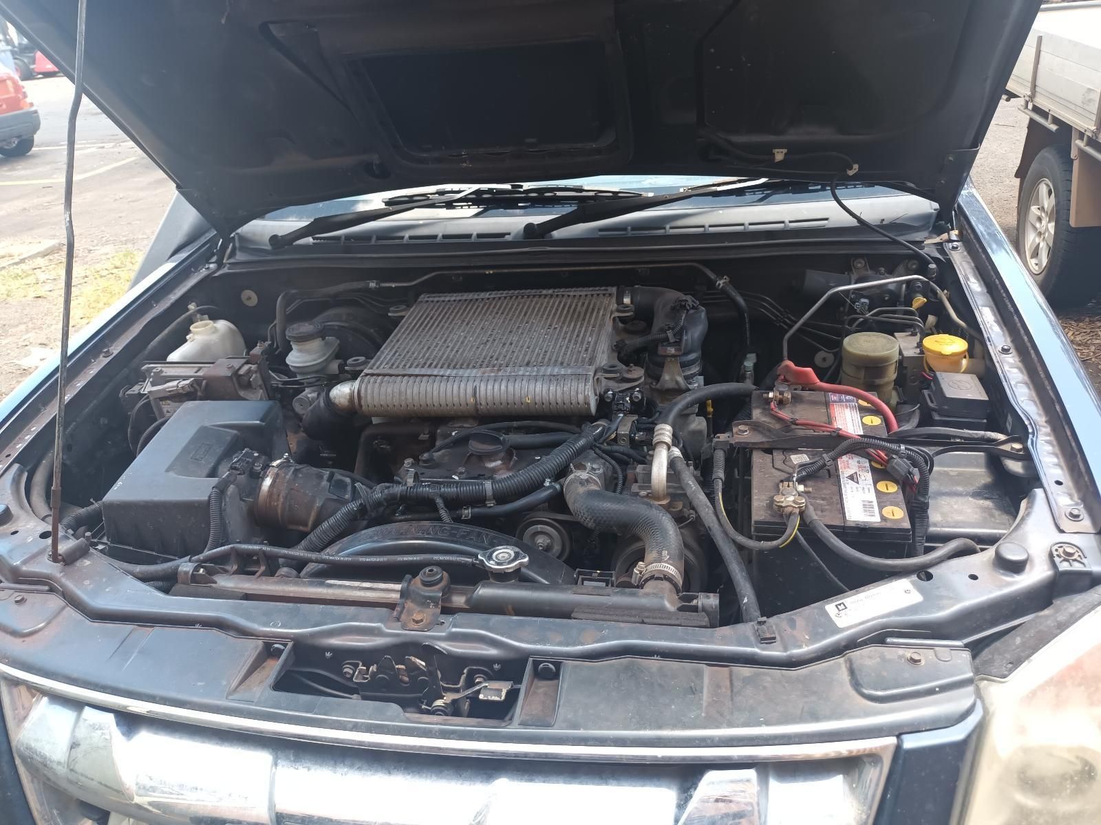 The Engine of a Car is Shown with the Hood Open — South West 4WD Wreckers in Harristown, QLD