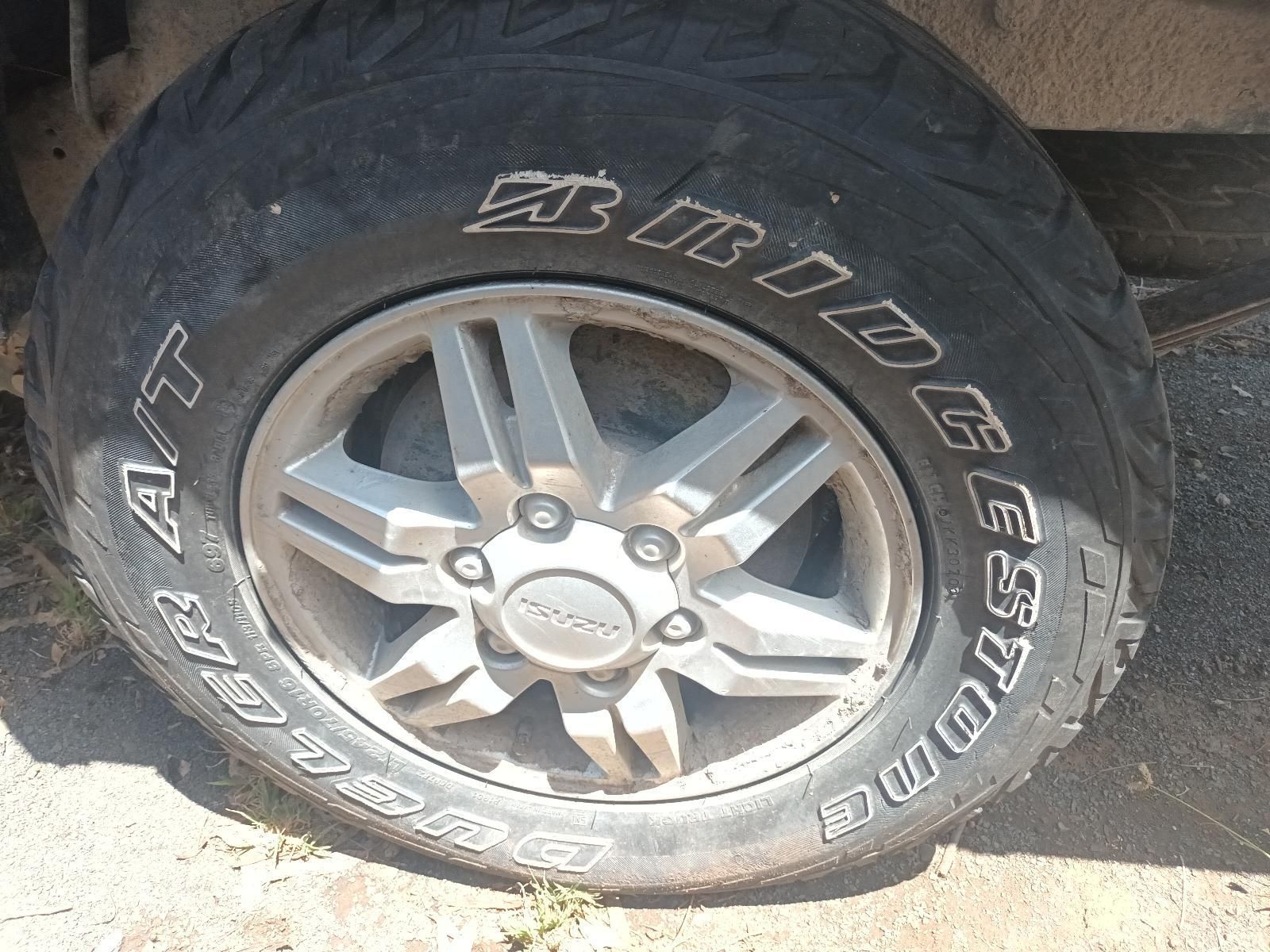 A Close Up of a Bridgestone Tire on a Car — South West 4WD Wreckers in Harristown, QLD
