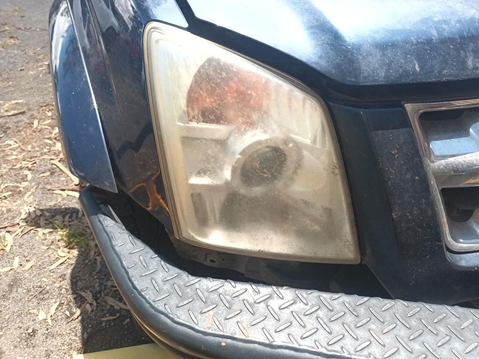 A Close Up of a Car's Headlight and Bumper — South West 4WD Wreckers in Harristown, QLD