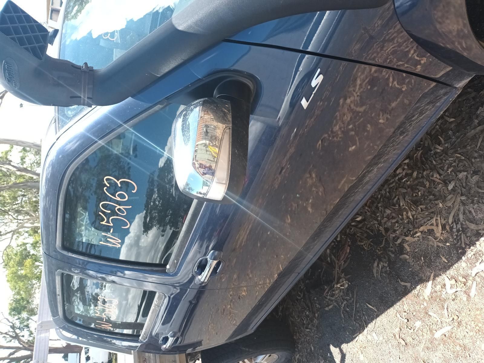 A Blue Truck with the Numbers Written on the Side — South West 4WD Wreckers in Harristown, QLD