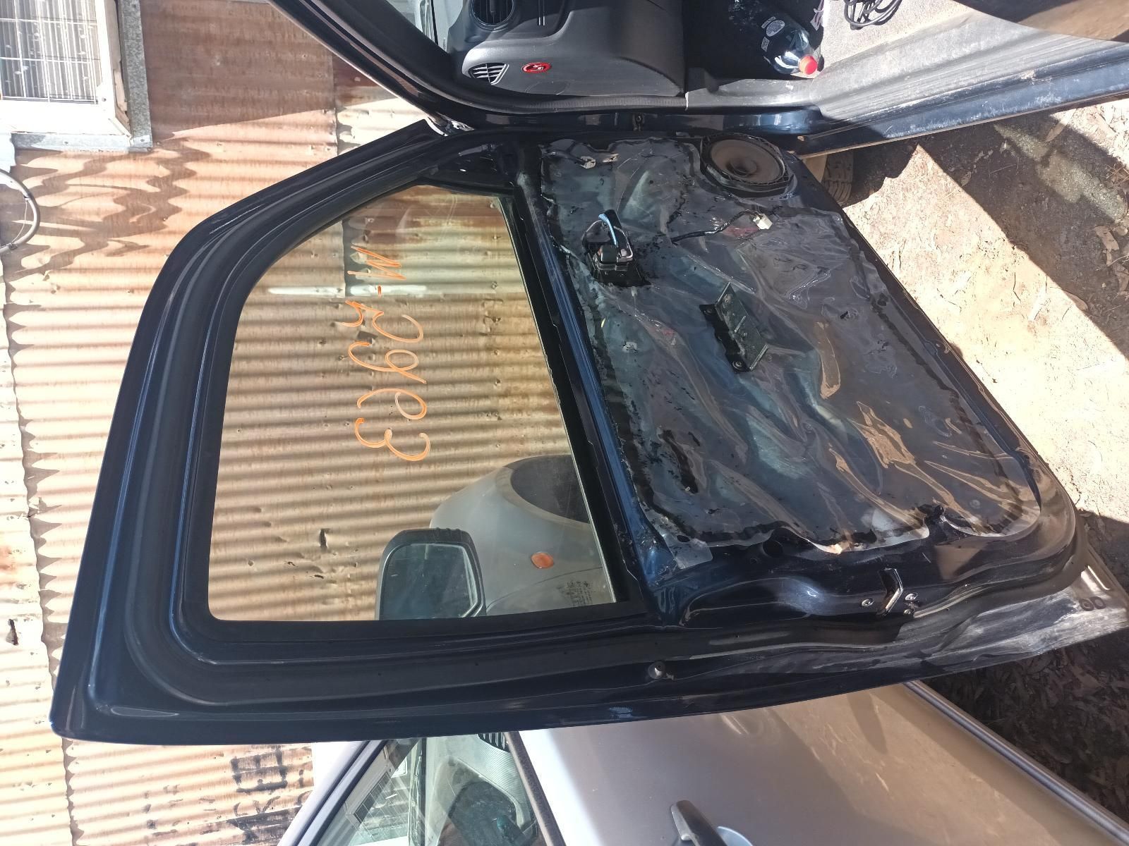 A Car with the Door Open and a Broken Window — South West 4WD Wreckers in Harristown, QLD
