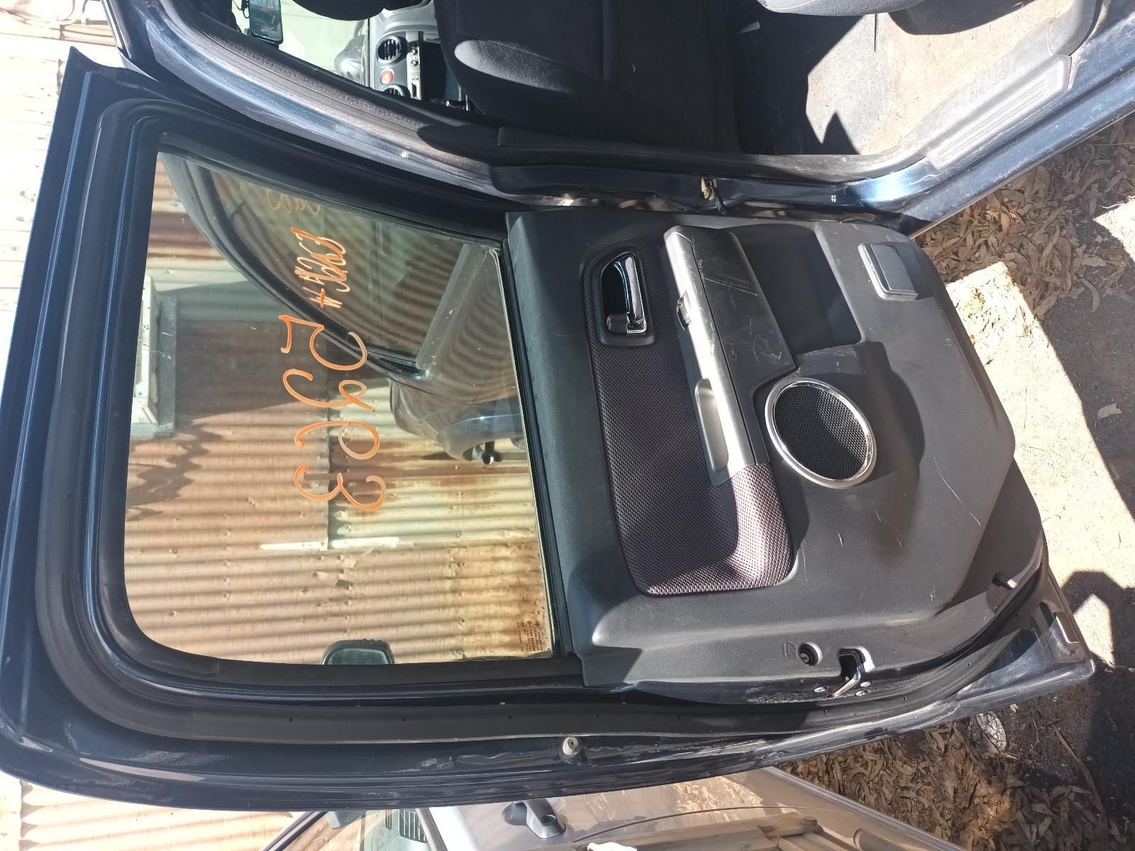 The Back Door of a Car is Open and Sitting on the Ground — South West 4WD Wreckers in Harristown, QLD