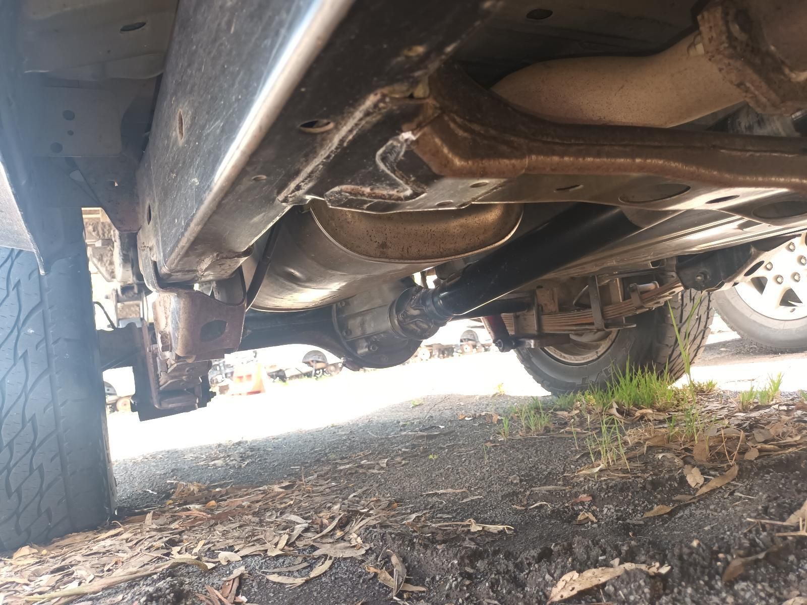 A Close Up of the Underside of a Car Parked on the Side of the Road — South West 4WD Wreckers in Harristown, QLD