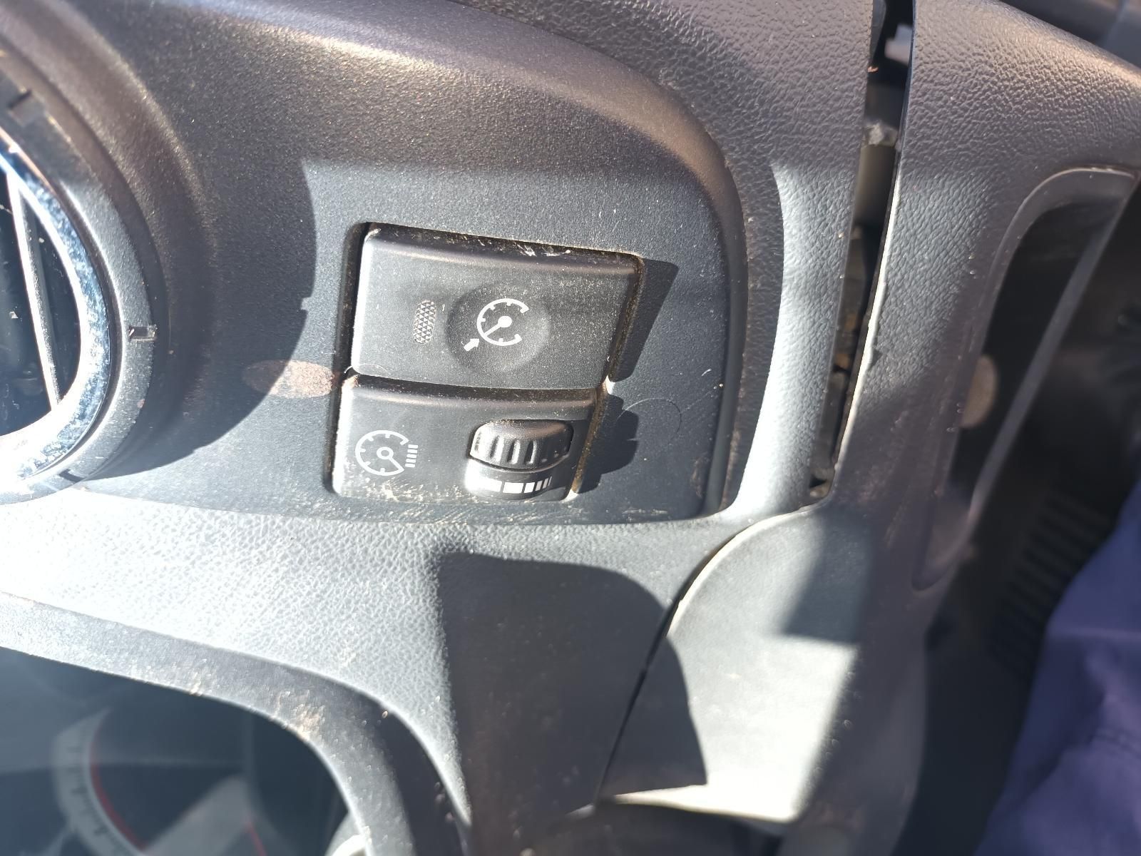 A Close Up of a Car Dashboard with Two Buttons on It — South West 4WD Wreckers in Harristown, QLD