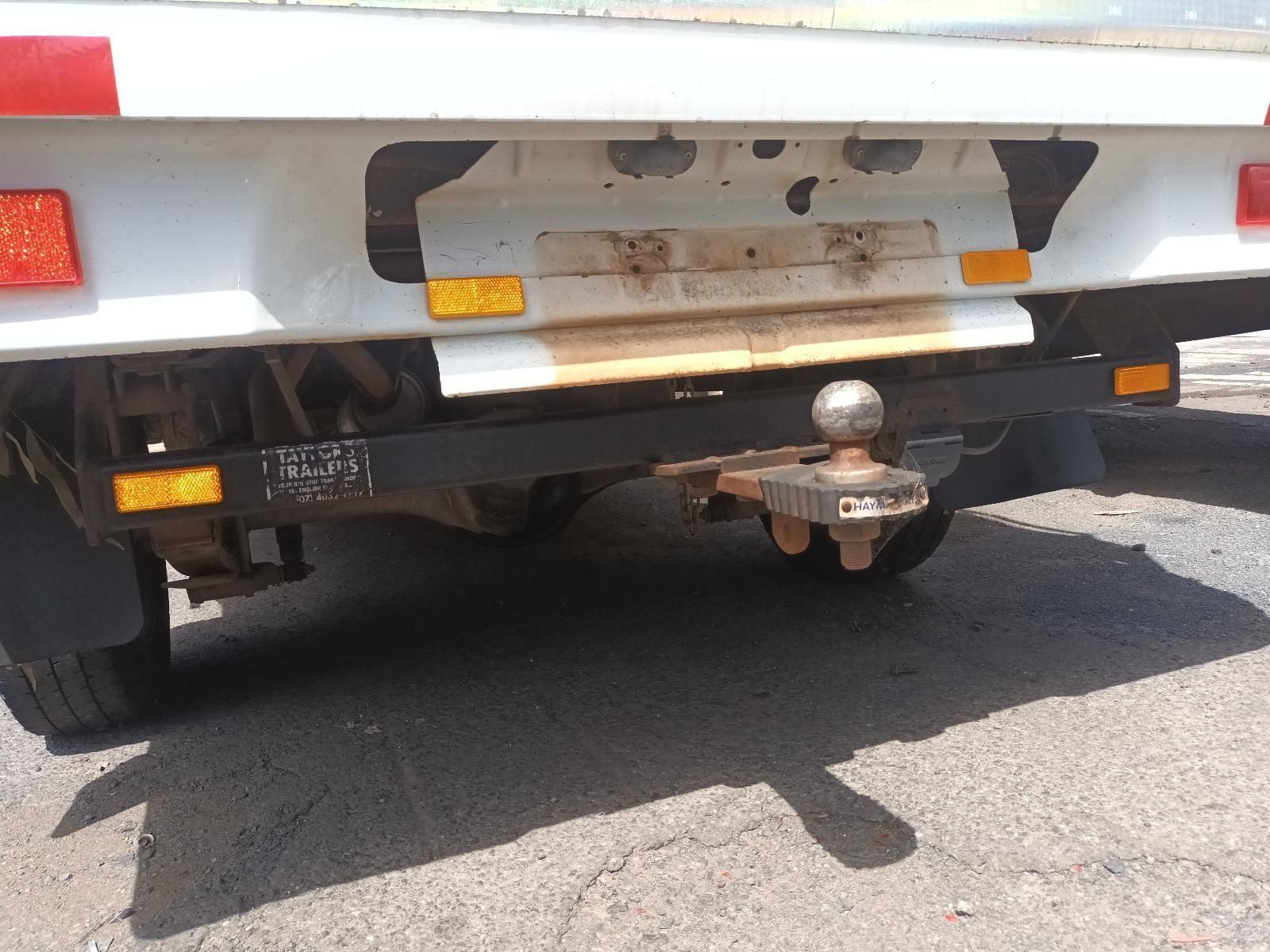 A White Truck with a Trailer Hitch Attached to It — South West 4WD Wreckers in Harristown, QLD
