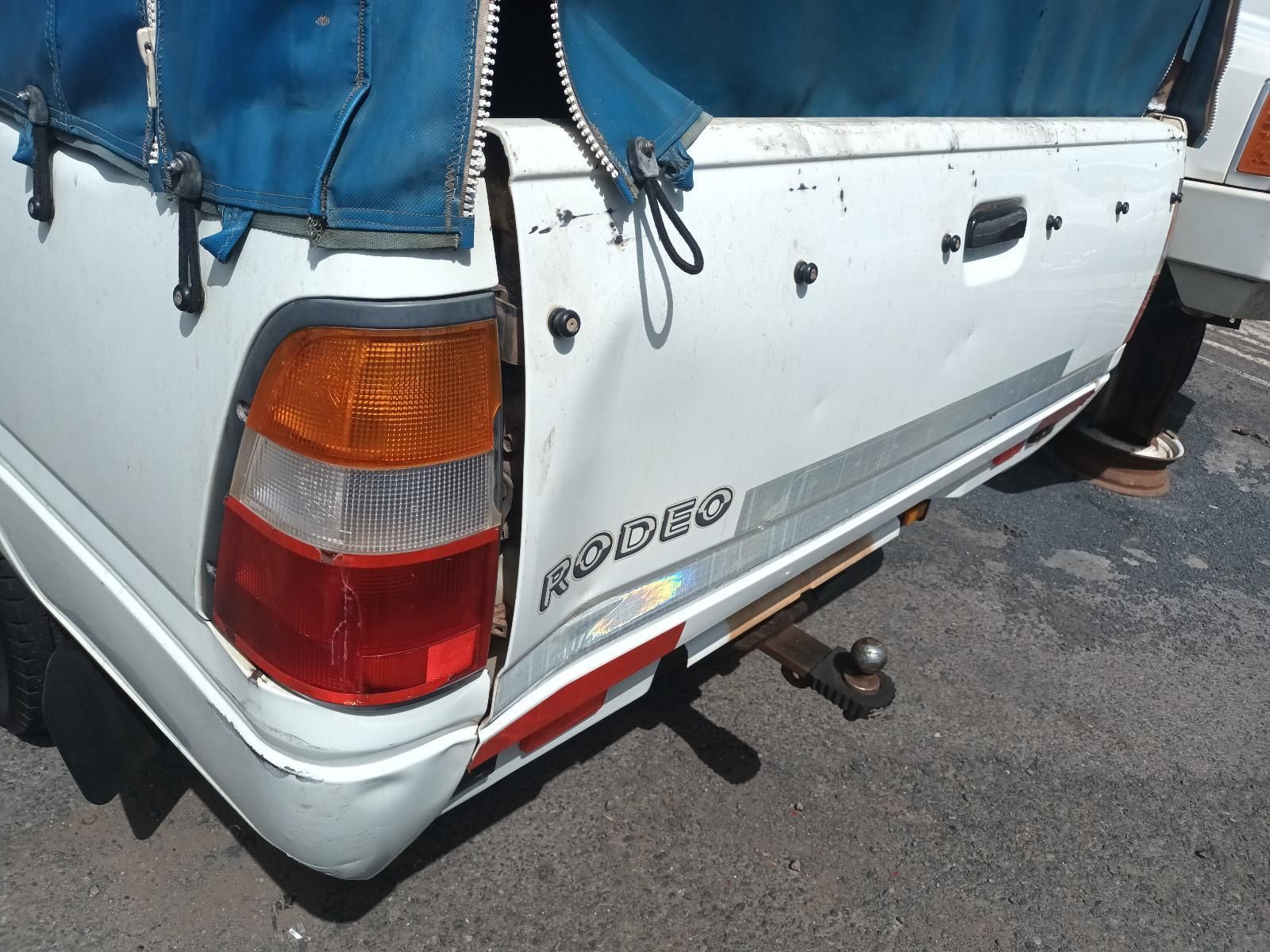 A White Rodeo Truck Has a Broken Tail Light — South West 4WD Wreckers in Harristown, QLD