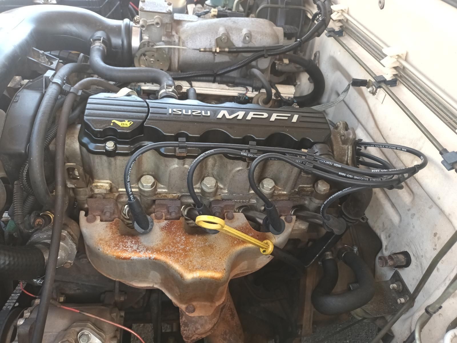 A Close Up of a Car Engine with the Word MPFI on It — South West 4WD Wreckers in Harristown, QLD