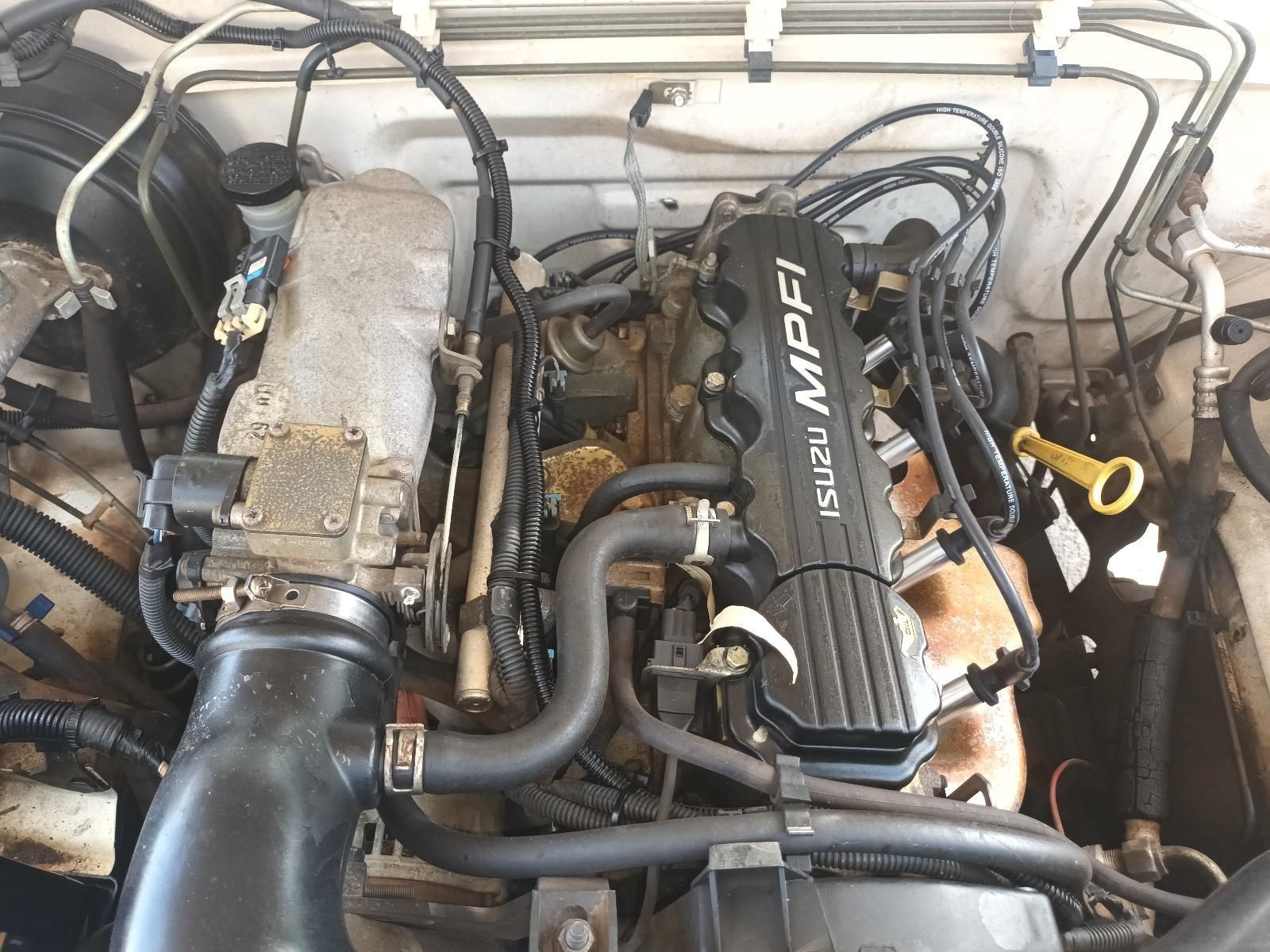 A Close Up of a Car Engine with the Word MPFI on It — South West 4WD Wreckers in Harristown, QLD