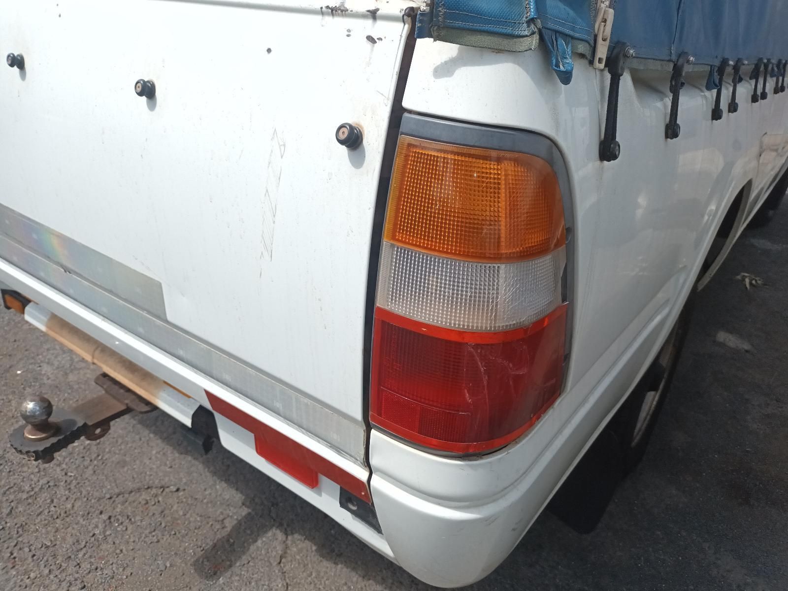 A White Truck with a Blue Tarp on Top of It — South West 4WD Wreckers in Harristown, QLD
