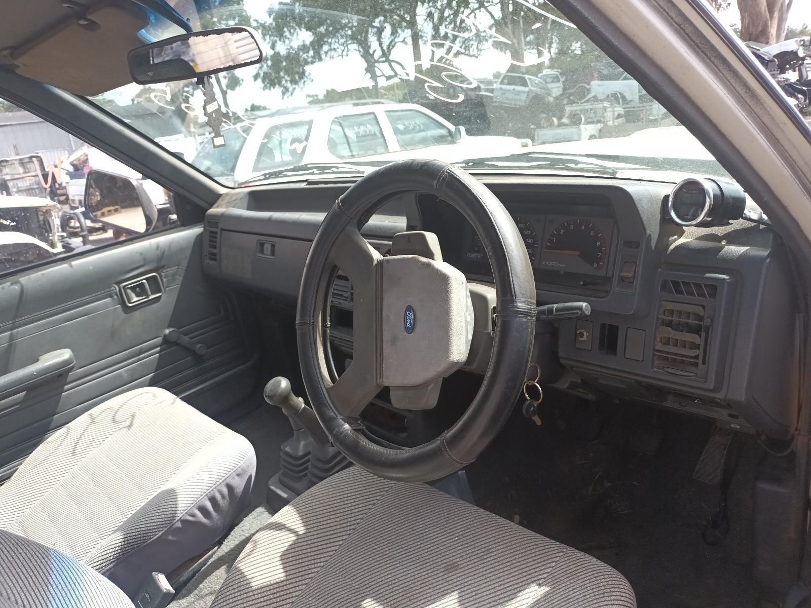 The Inside of a Car with a Steering Wheel and Dashboard — South West 4WD Wreckers In Brisbane, QLD