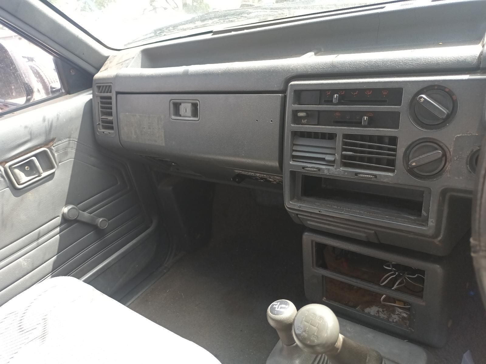 The Inside of an Old Car with a Dashboard and Steering Wheel — South West 4WD Wreckers In Brisbane, QLD