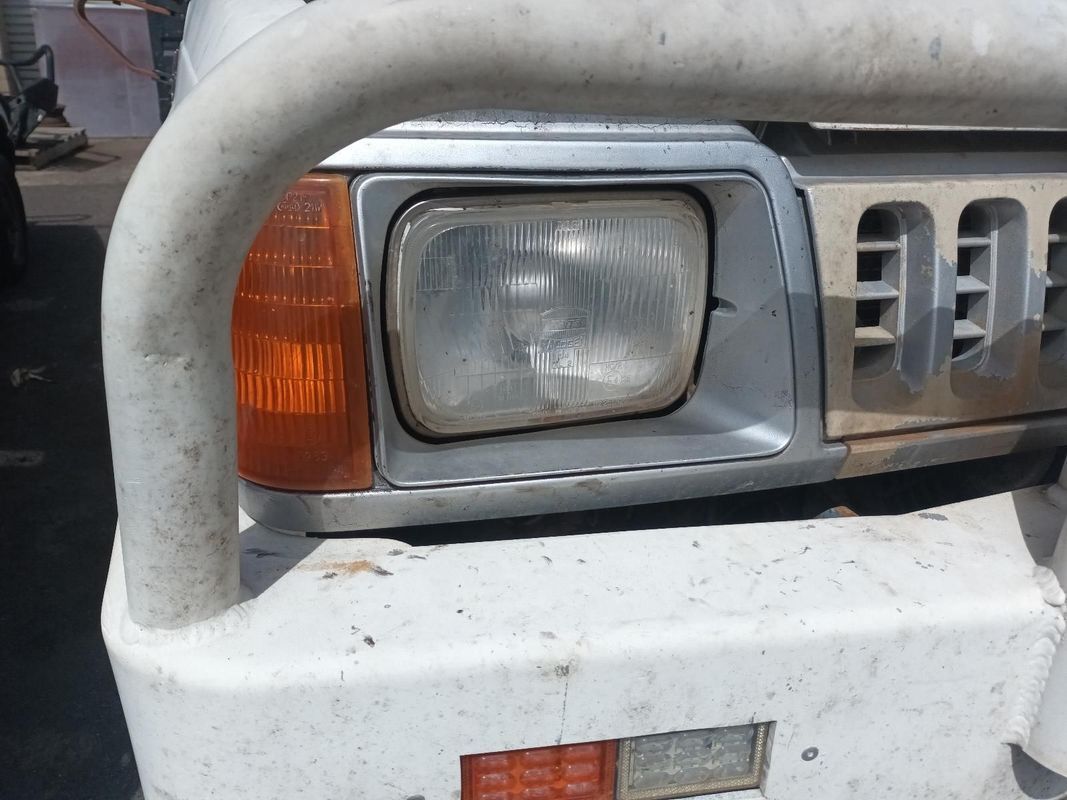 A Close Up of a Car's Headlight and Bumper — South West 4WD Wreckers In Brisbane, QLD
