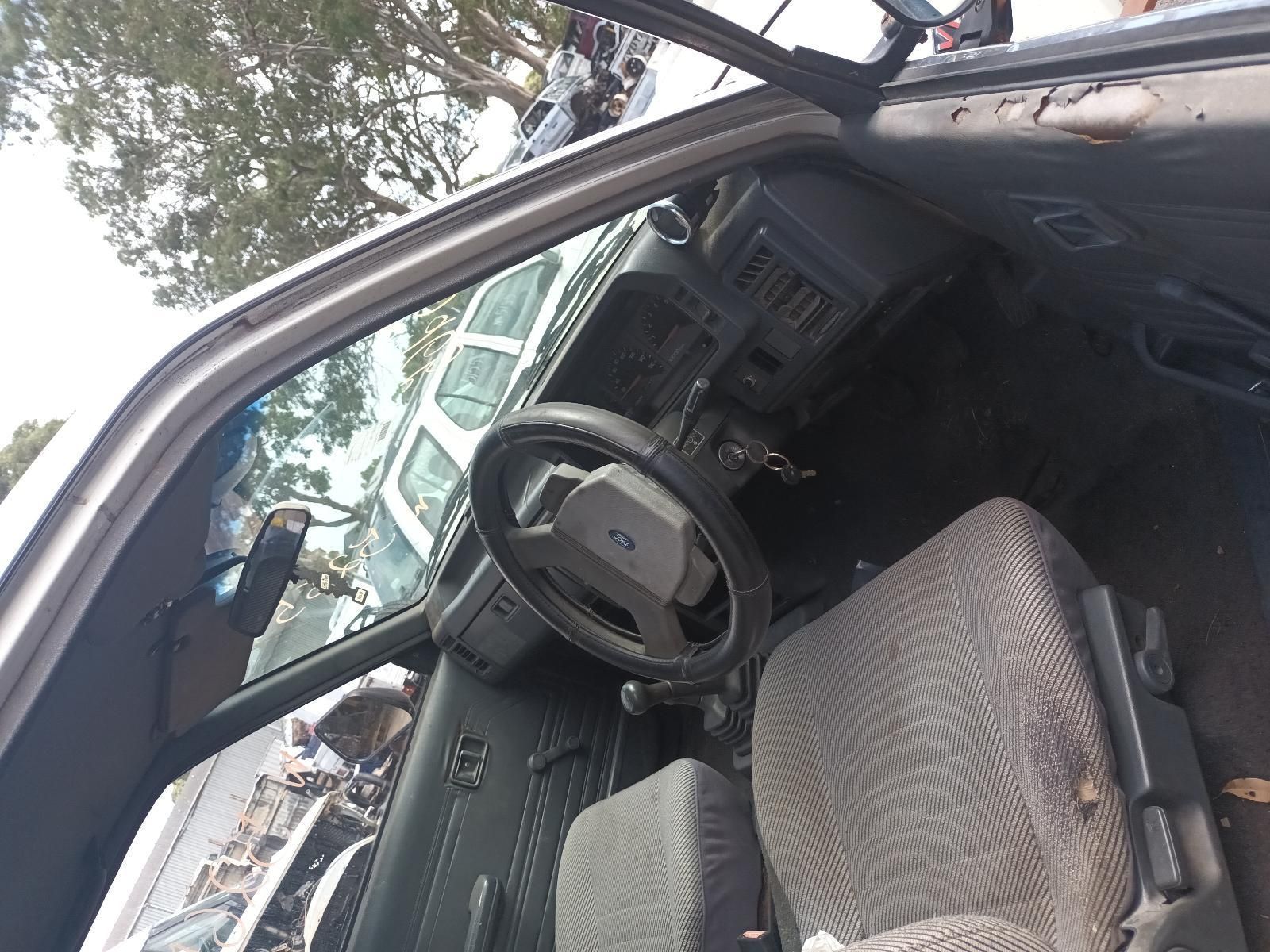 The Inside of a Car with a Steering Wheel and Seats — South West 4WD Wreckers In Brisbane, QLD