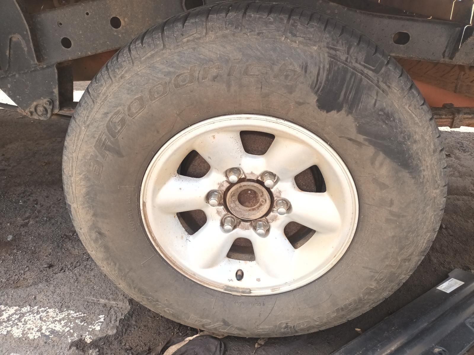 A Close Up of a Tire on a Car with a White Rim — South West 4WD Wreckers In Brisbane, QLD