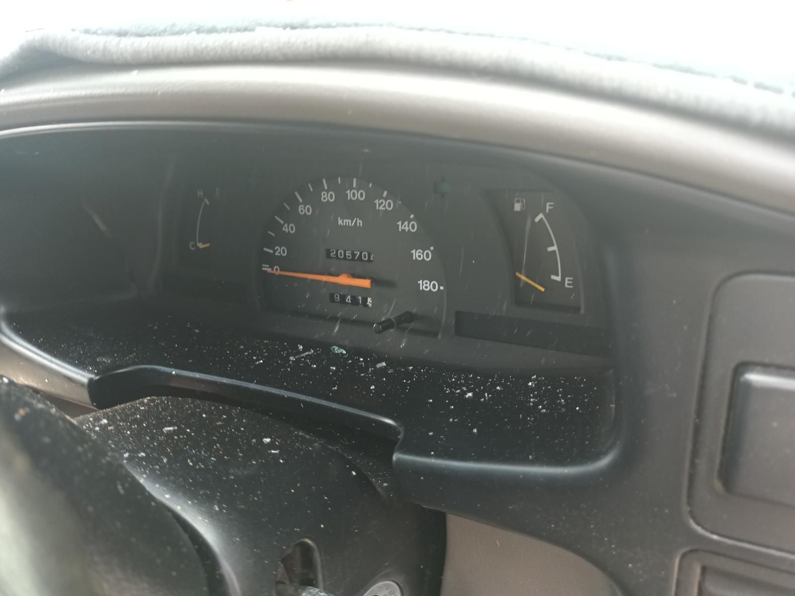 A Dirty Dashboard of a Car with a Speedometer — South West 4WD Wreckers In Brisbane, QLD 