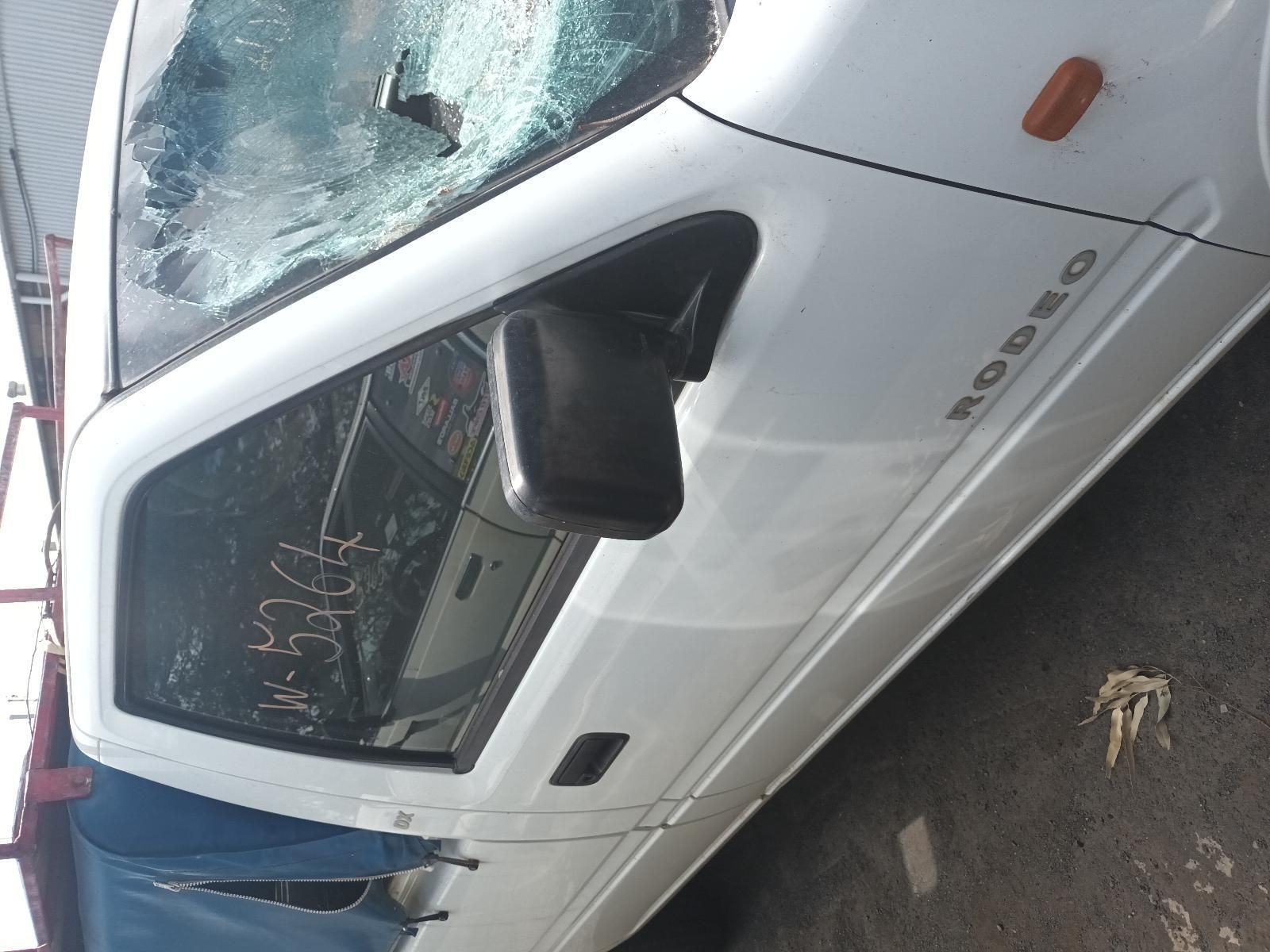 A White Rodeo Truck with a Broken Windshield — South West 4WD Wreckers In Brisbane, QLD